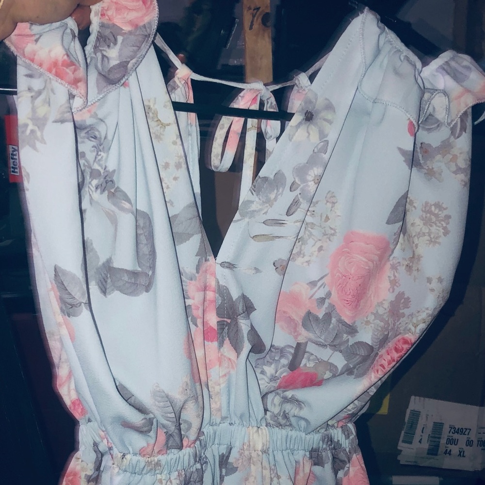 Women’s light blue, pink and dark purple romper